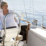 Happy retired couple on a yacht