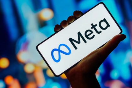 In this photo illustration, the Meta Platforms logo is displayed on a smartphone screen